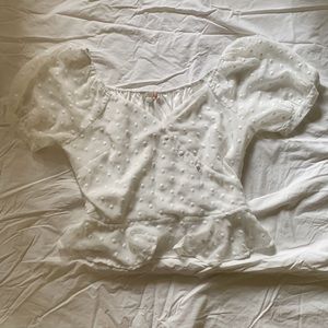 White puffy sleeved blouse